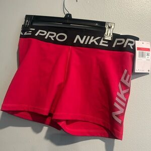 Nike Pro Women's Bright Pink Bike Shorts with Branded Waistband
